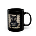 Black mug with a cat graphic and text on a white background
