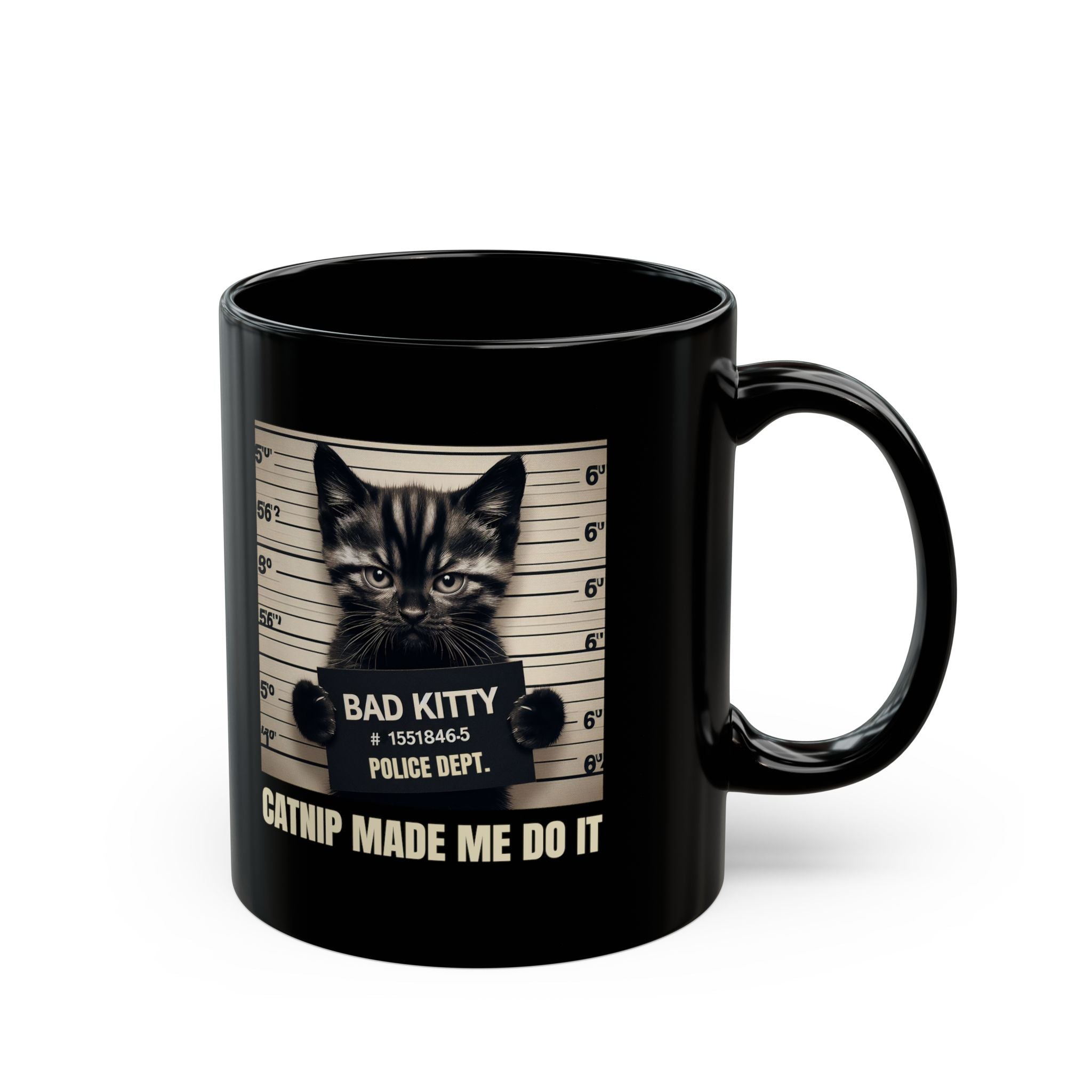 Black mug with a cat graphic and text on a white background
