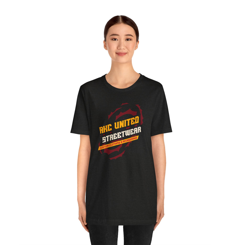 Person wearing a black t-shirt with 'RHC United Streetwear' logo on a white background