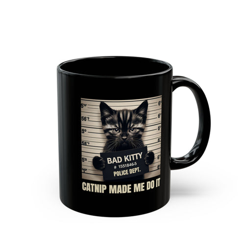 Black mug with a cat graphic and text on a white background
