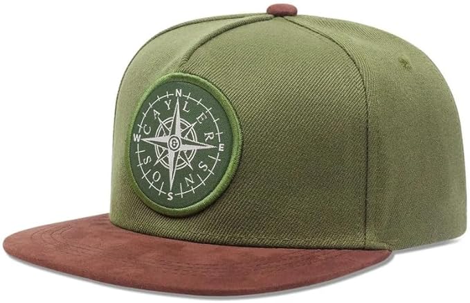 Green cap with compass design on a white background