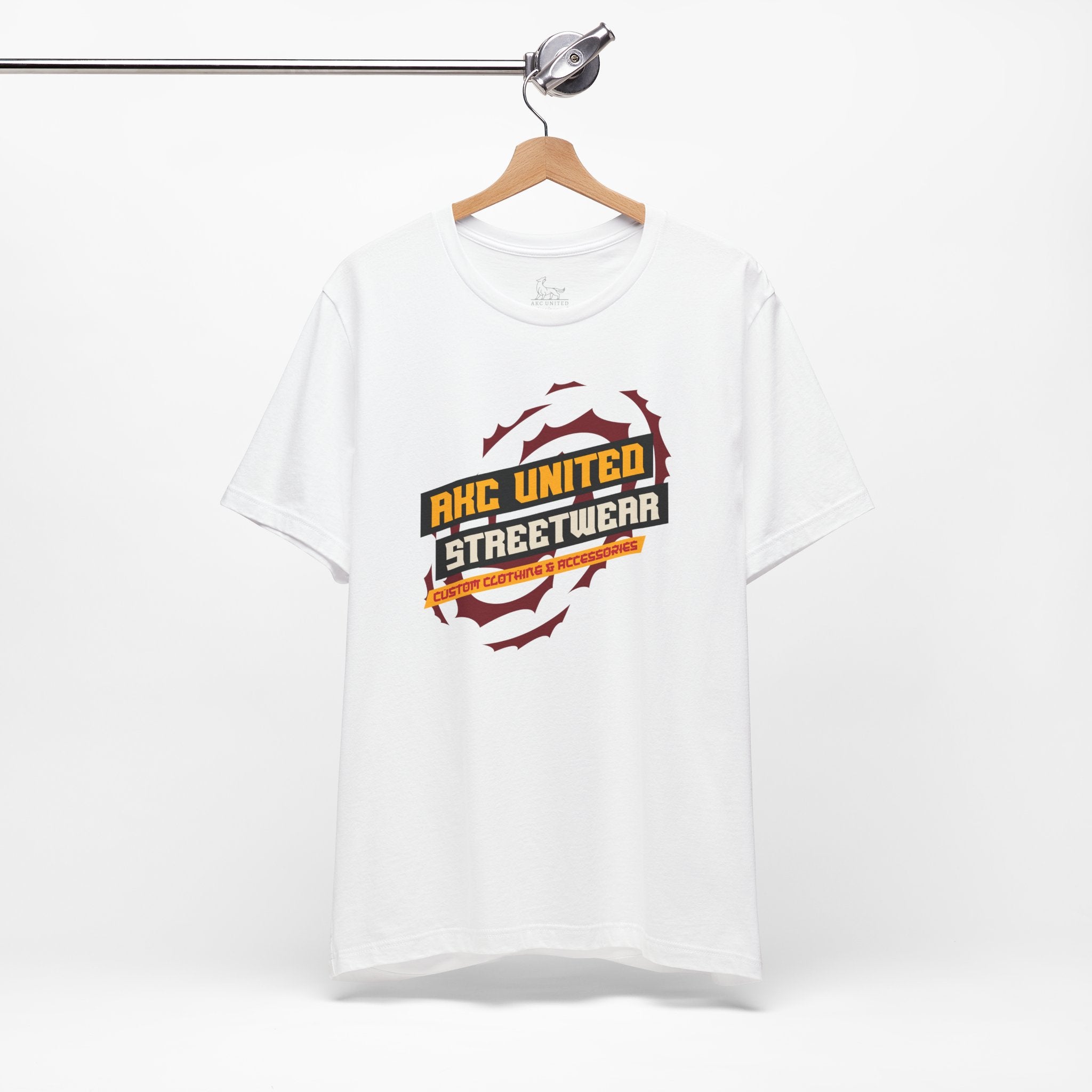 White t-shirt with 'RHC United Streetwear' logo on a hanger against a white background