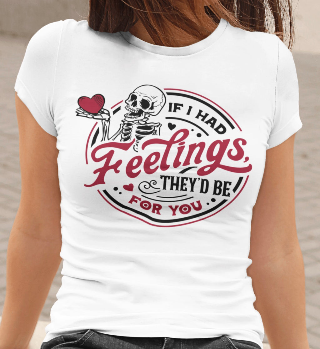 White t-shirt with skeleton design and text on a person wearing it.