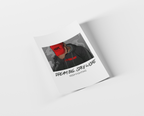 A printed poster or card shown at an angle on a light gray background. The artwork features a person in a black hoodie with a red hood or face covering that says 'HOPE', plus the text 'DREAM BIG.