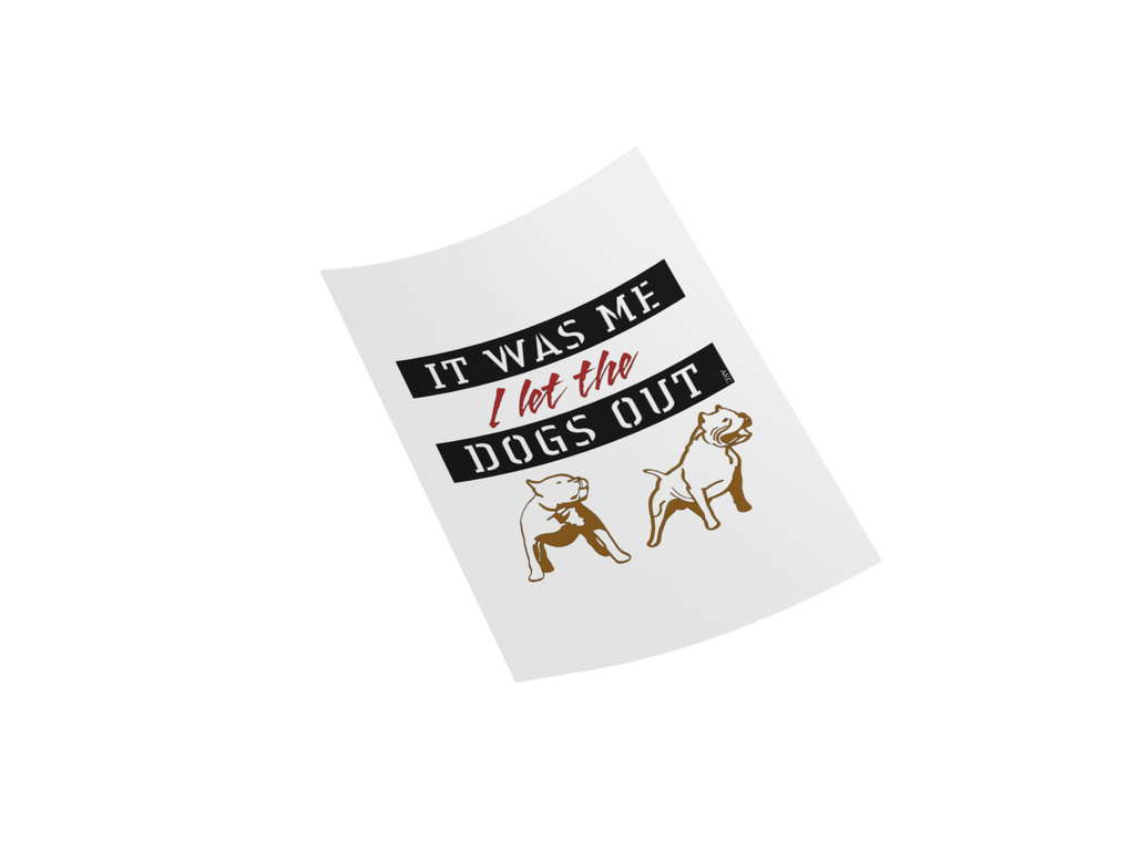 A white rectangular sticker or sign shown at an angle on a white background, printed with the phrase 'IT WAS ME I let the DOGS OUT' in black and red text, plus two brown dog illustrations.
