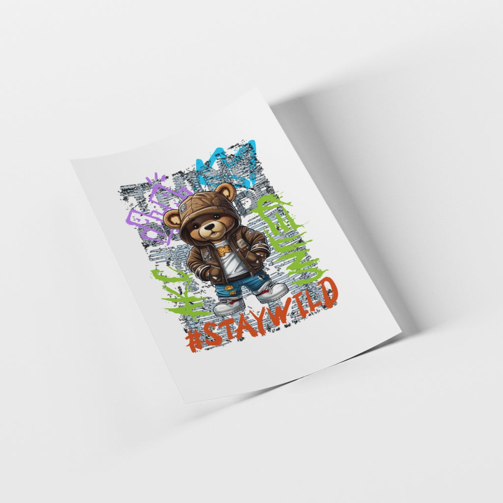 Card with a teddy bear in a hat and coat, surrounded by colorful graphics and the text 'Stay Wild' on a white background.