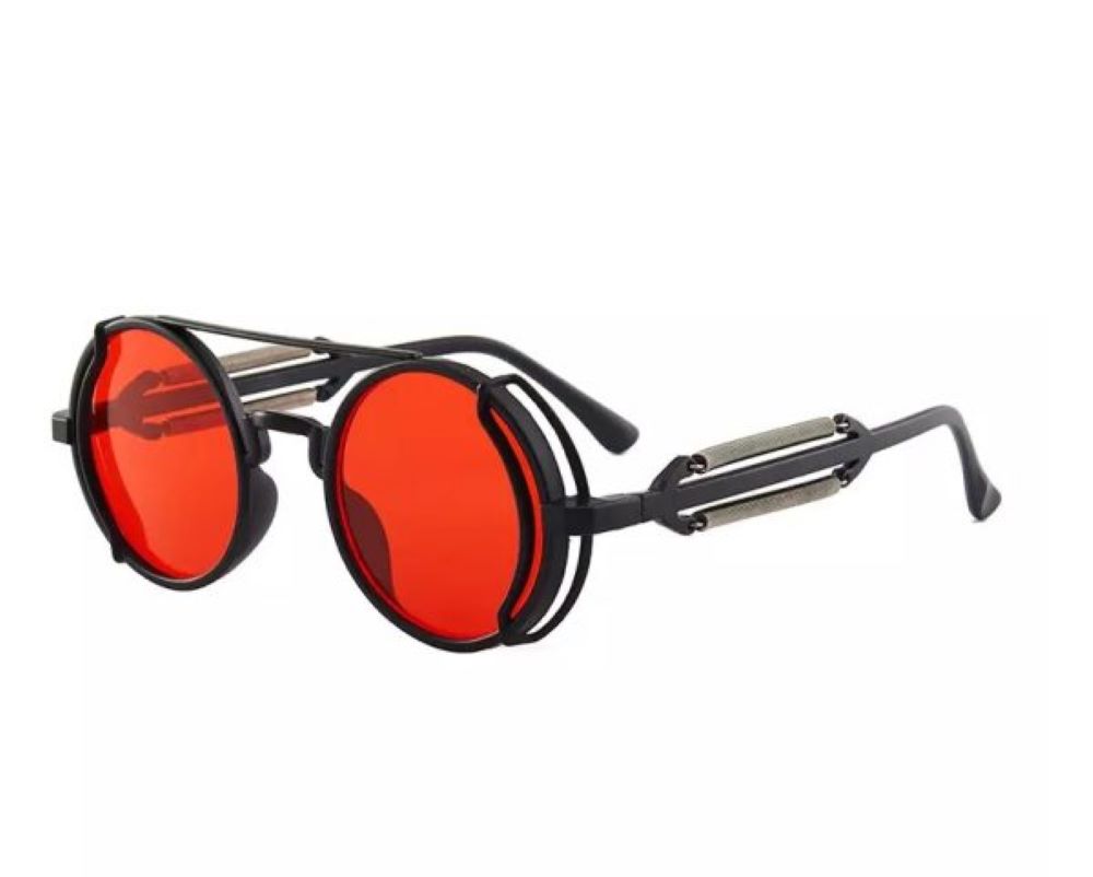 Sunglasses with red lenses and black frames on a white background