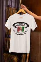White t-shirt with 'Hungarian Grandpa' text and flag design on a hanger.