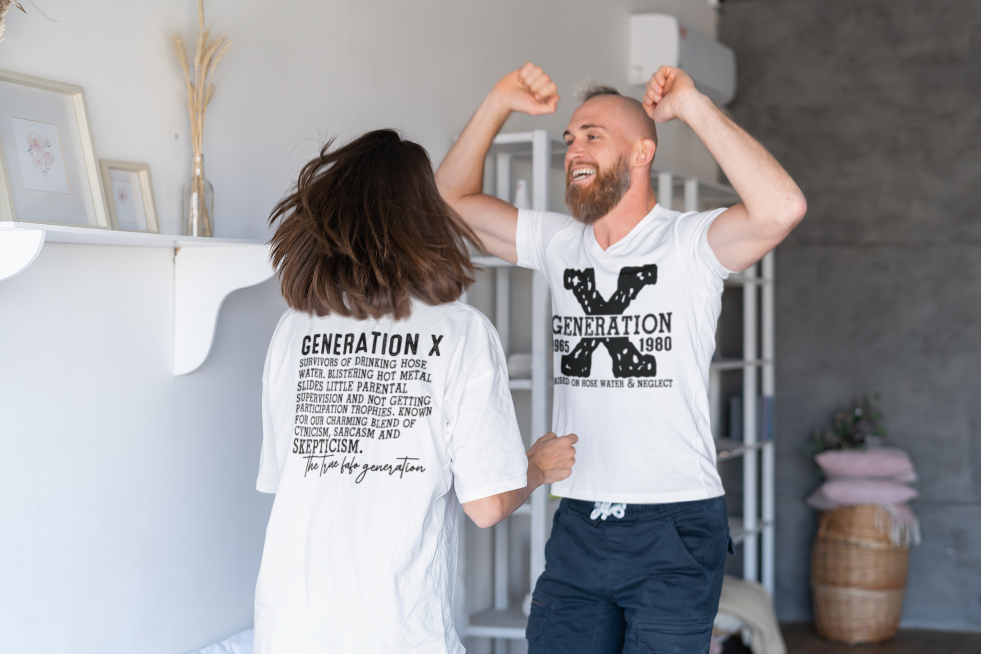 Two people wearing 'Generation X' t-shirts in a casual indoor setting.