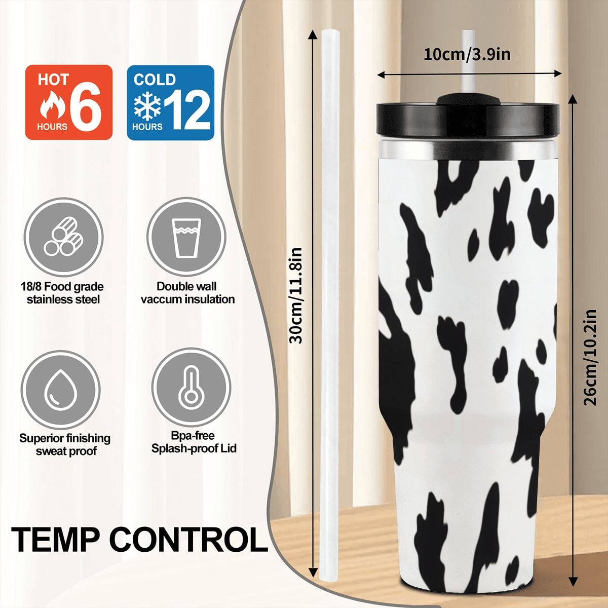 Cow print insulated tumbler with temperature control features and dimensions displayed.