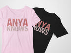 Pink and black t-shirts with 'ANYA KNOWS' text on a white background