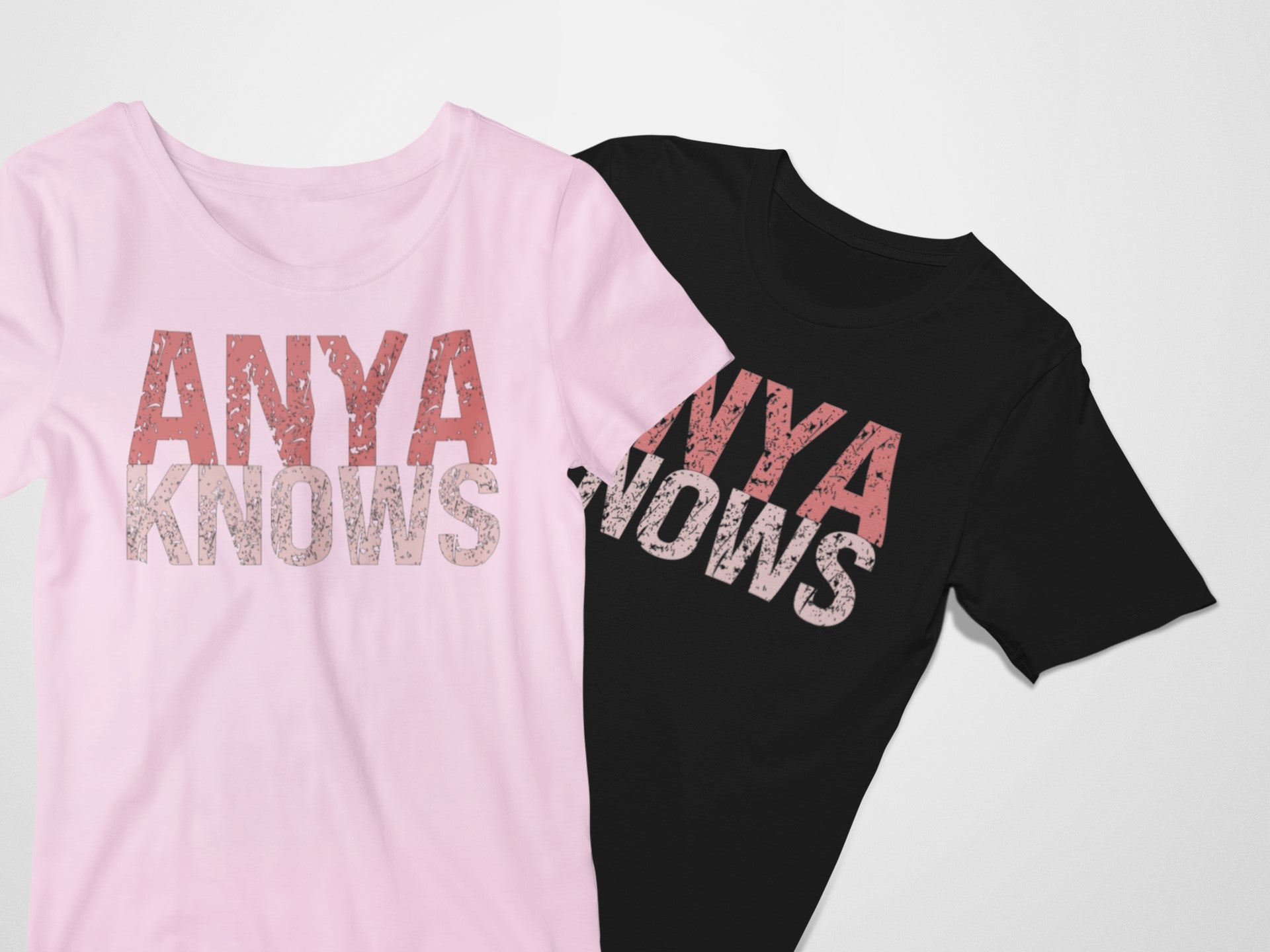 Pink and black t-shirts with 'ANYA KNOWS' text on a white background