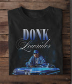 Black t-shirt with 'DONK Lowrider' graphic on a wooden background