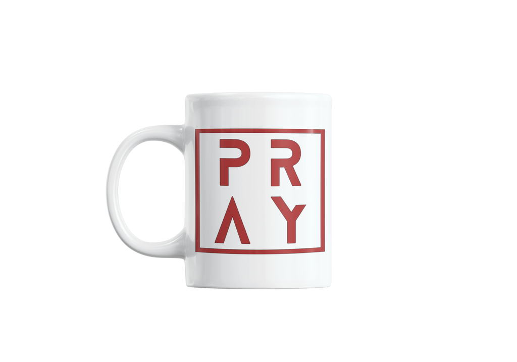 White mug with red 'PRAY' text on a white background