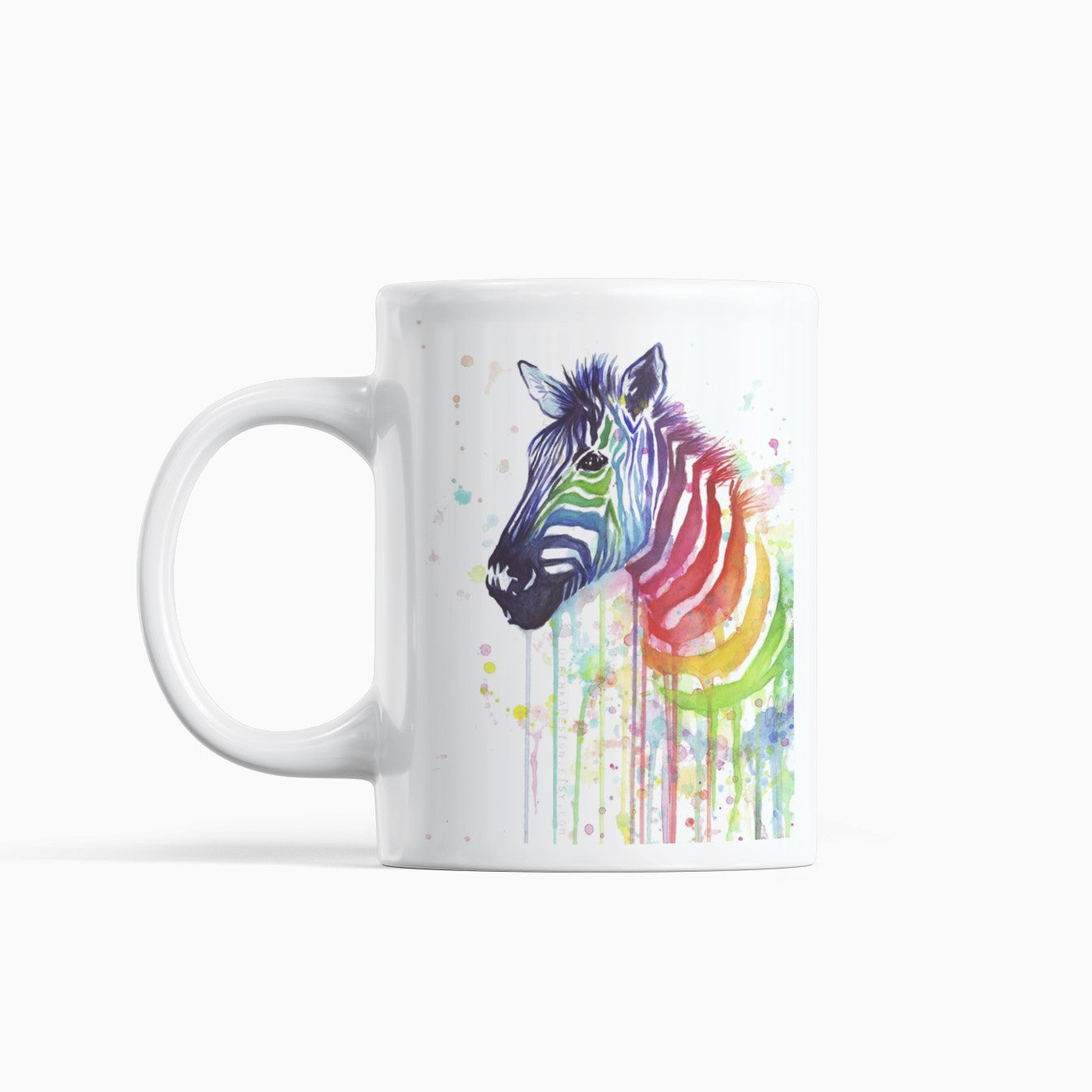 White mug with a colorful zebra design on a white background