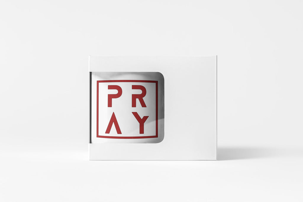White card with red 'PRAY' text on a white background