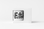 A white rectangular box with a die-cut window displaying black typography that reads 'FAITH' made from stacked words, set against a clean white background.
