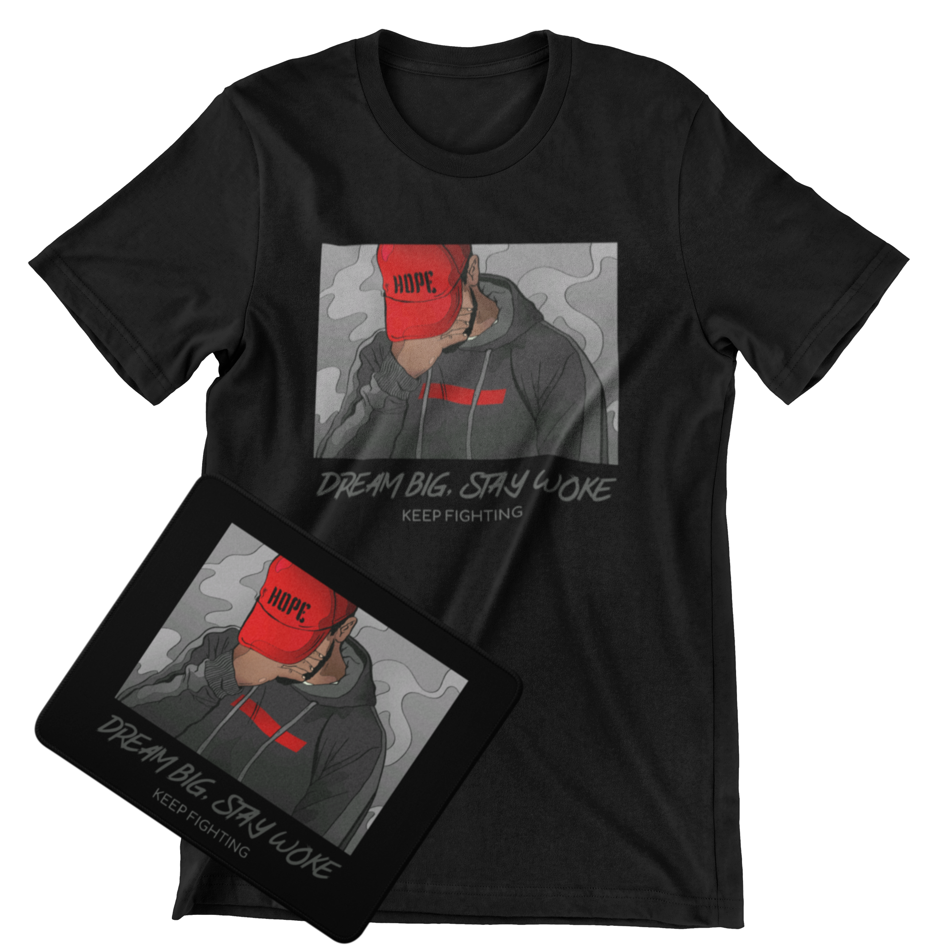 A black short-sleeve graphic T-shirt displayed on a white background, with a matching black rectangular print or card placed in front. The graphic shows a person in a gray hoodie wearing a red cap with the word HOPE, plus the text 'DREAM BIG.