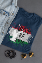 Blue t-shirt with graphic design and accessories on a gray surface