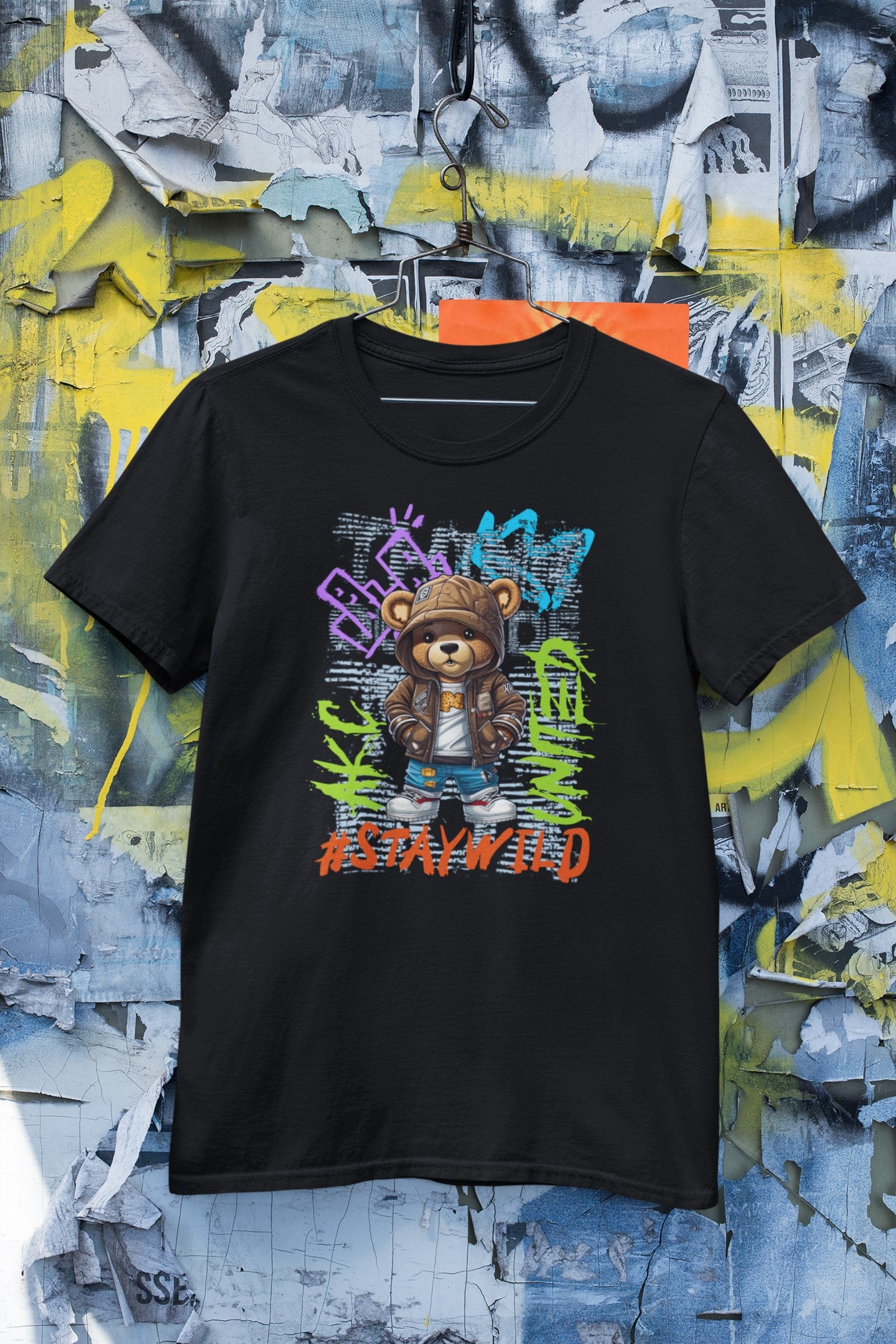 Black t-shirt with a graphic design of a bear and text on a colorful, abstract background