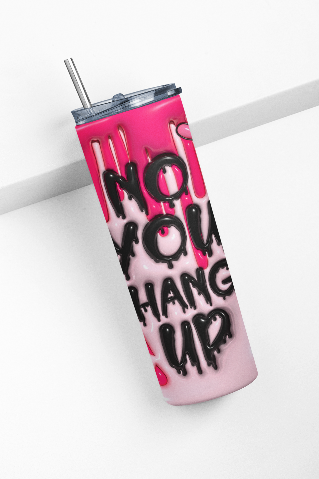 A pink and light pink insulated tumbler with a clear lid and metal straw, featuring the text 'NO YOU HANG UP' in black dripping lettering, set against a clean white background.