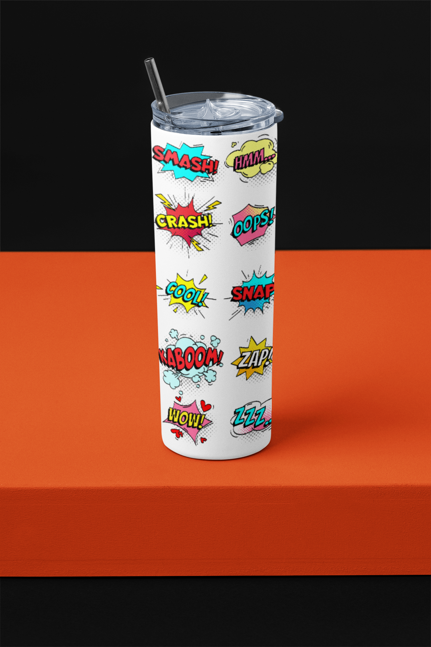 Tumbler with comic book sound effect design on a black and orange background