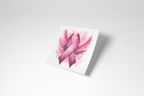 Pink ribbon with floral design on a white card