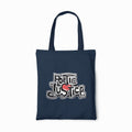 Navy blue tote bag with 'Poetic Justice' design on a white background