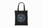 Black tote bag with blue circular design on a white background