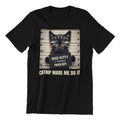 Black t-shirt with a graphic of a cat in a mugshot and text 'Bad Kitty' on a white background