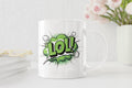 White mug with green 'LOL!' design on a white background