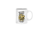A white ceramic coffee mug featuring a cartoon bee wearing sunglasses with the text 'WHY IS THE BEE CAUSE' above and 'I'M COOL' below.