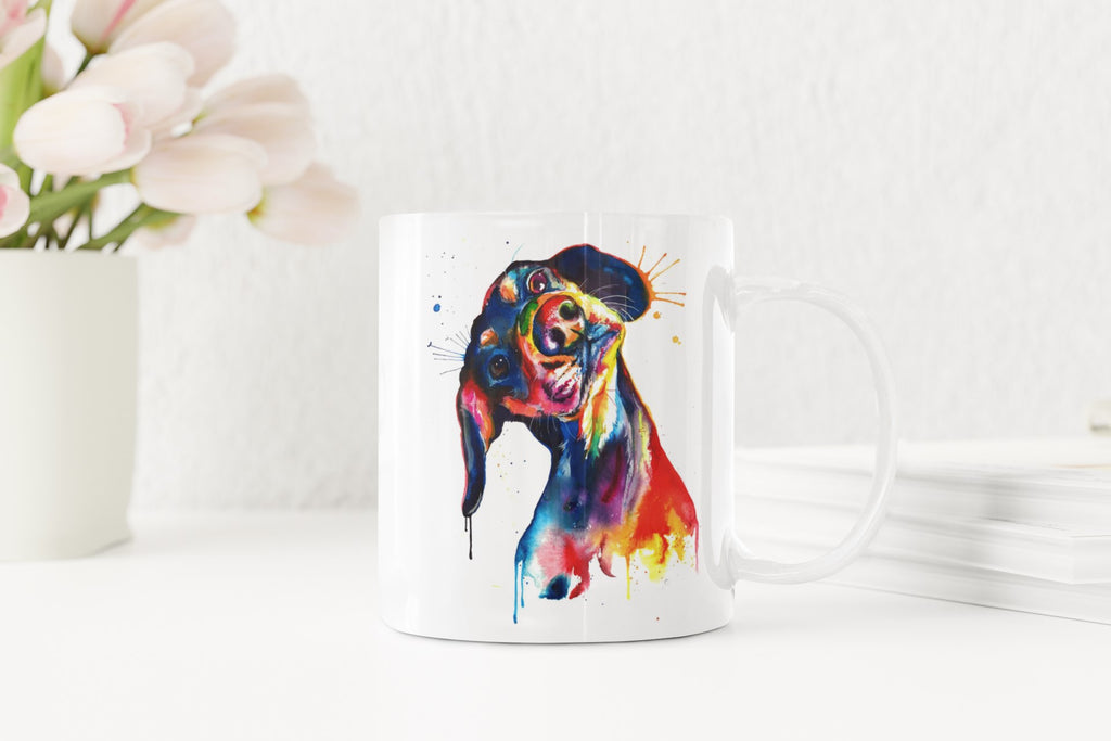 Colorful dog illustration on a white mug with flowers and plates in the background