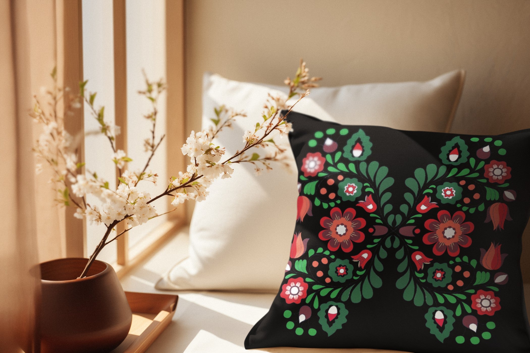 Decorative pillow with floral pattern on a neutral background