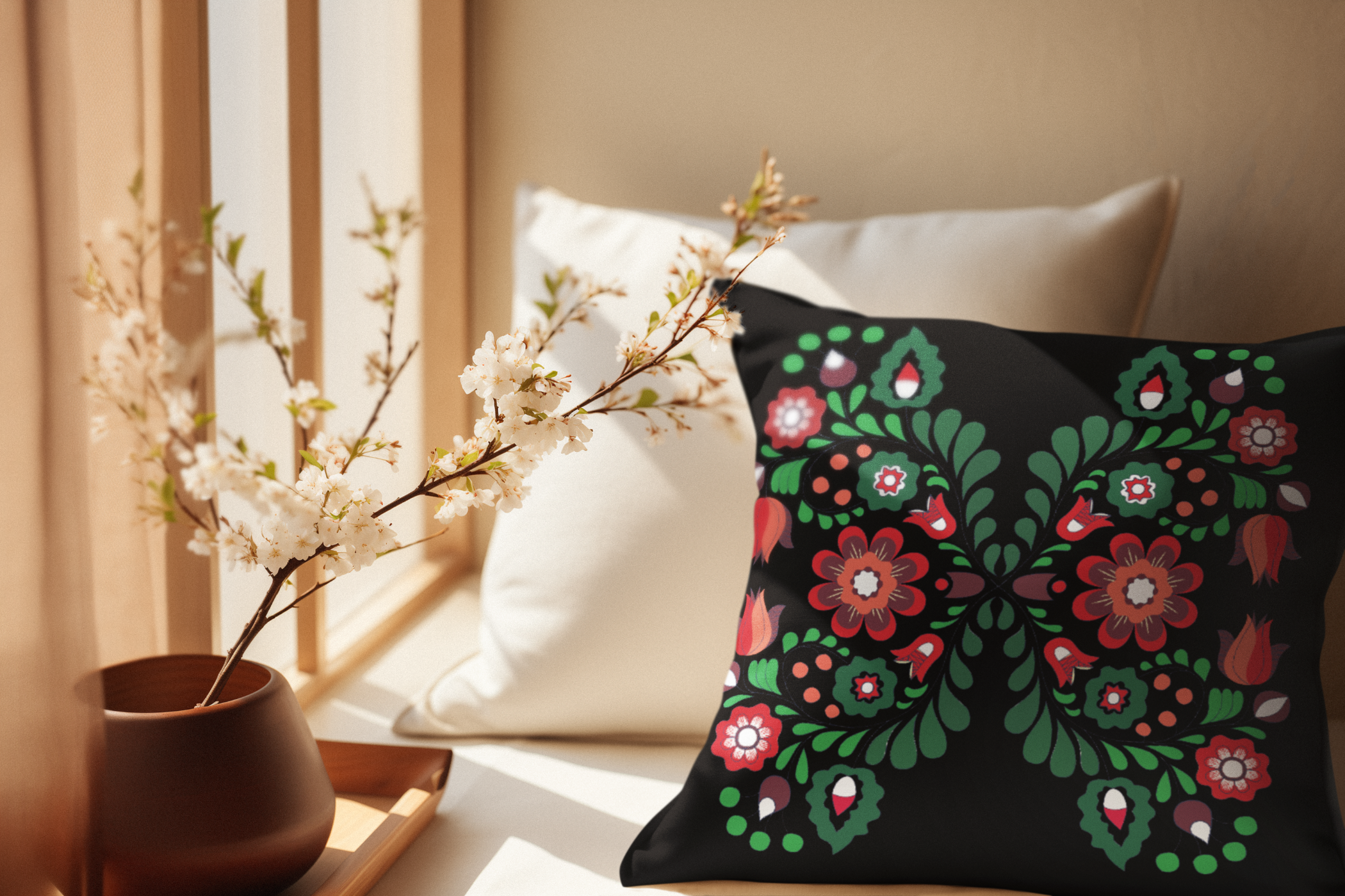Decorative pillow with floral pattern on a neutral background