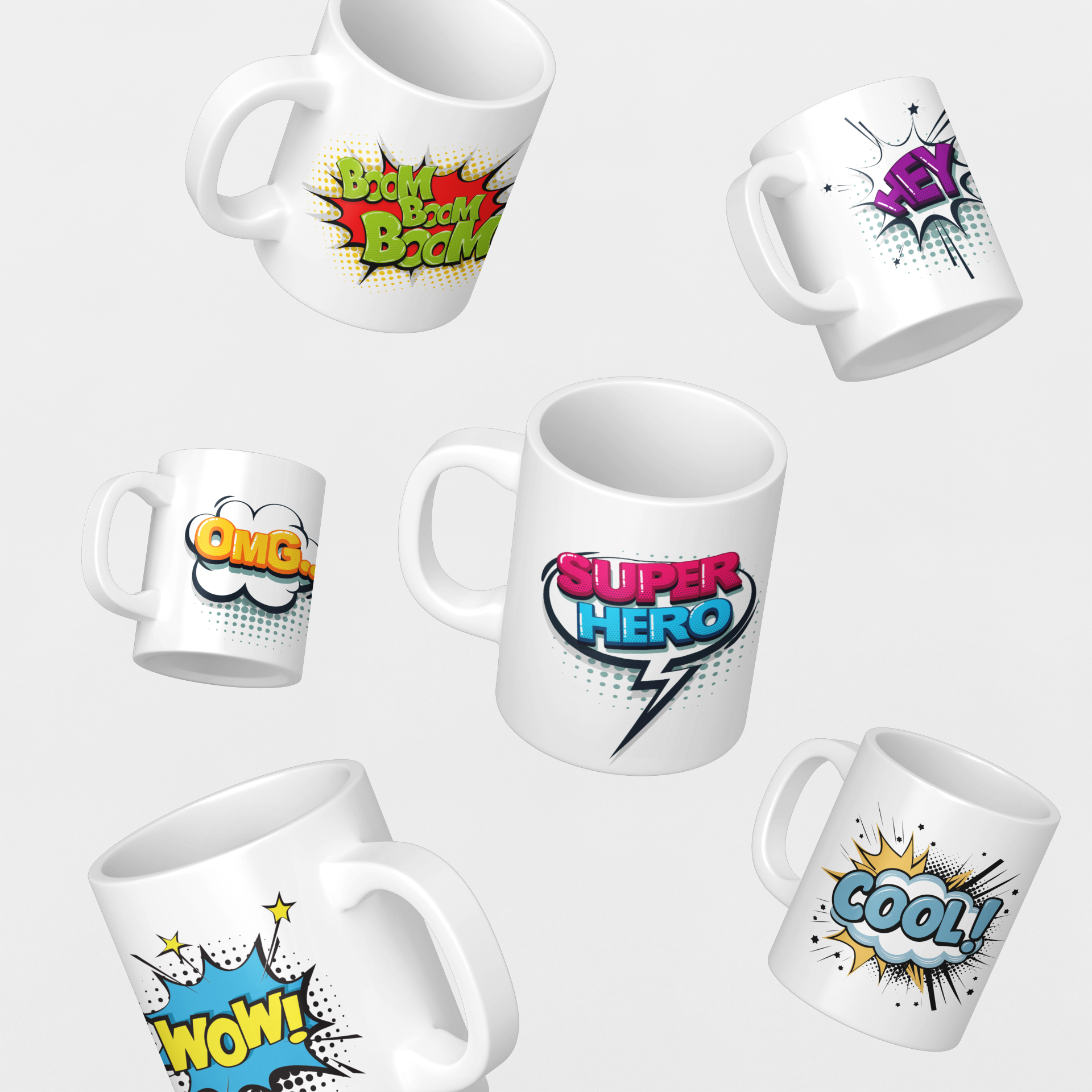 Set of white mugs with colorful comic-style text designs on a light gray background
