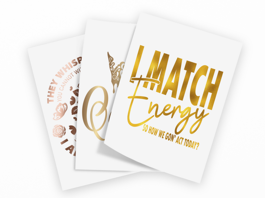 Three overlapping white cards or posters with metallic rose-gold and gold text and graphics on a white background. The front card reads 'I MATCH Energy' with smaller text 'SO HOW WE GO' ACT TODAY?'.