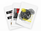 Three overlapping white art prints or cards with graphic text and illustrations, including 'IT WILL DO', 'HOPE', 'DREAM', and 'BROKEN HEART' with 'THE BRONX WORLD' branding, shown on a light gray background.