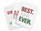 Three white greeting cards fanned out on a black background, each printed with bold distressed text. The front card reads 'BEST.