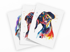 Three watercolor art prints of a dachshund dog in colorful watercolor style, fanned out on a white background.