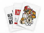Three overlapping white art prints or cards on a black background, each featuring bold graphic designs: a bear in a red cap holding a money sack with a dollar sign, a red and white HI graphic, and black text reading 'OLD I STILL RE'.