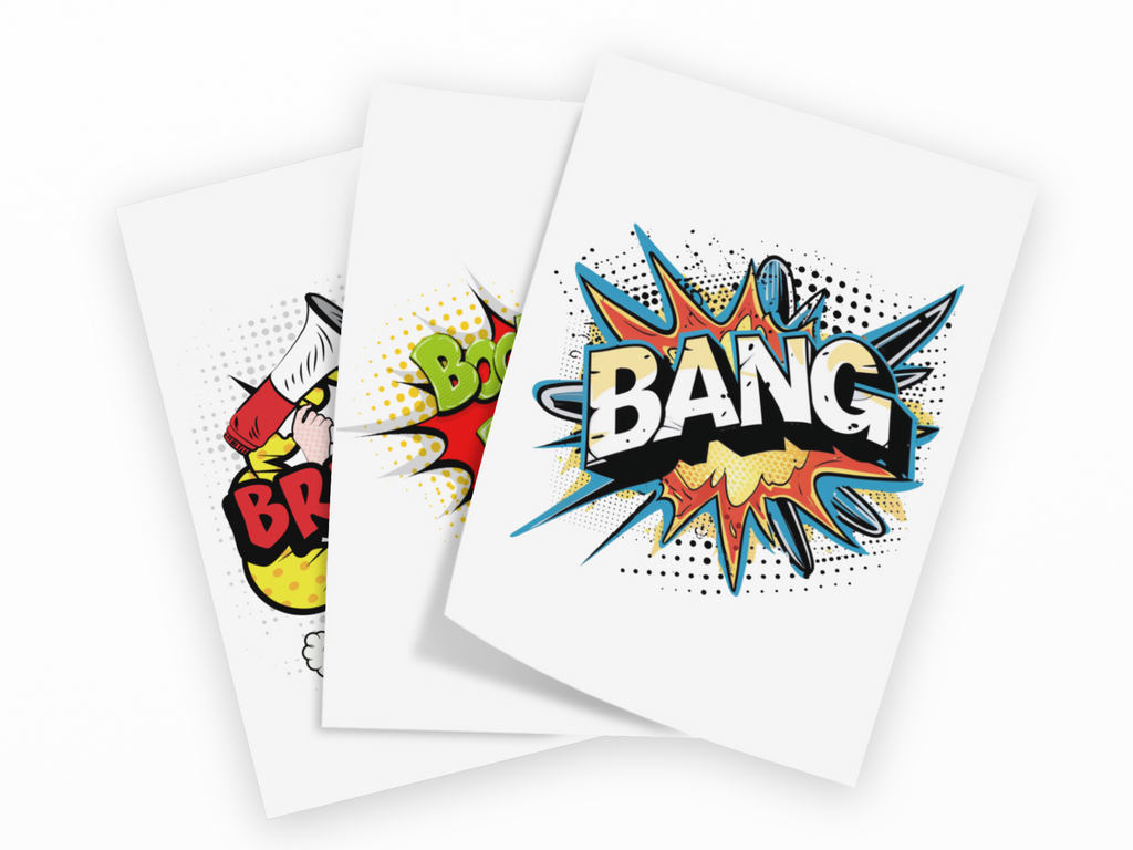Three overlapping white art prints featuring colorful comic-style explosion graphics with the word 'BANG' in bold comic lettering, shown on a light gray background.