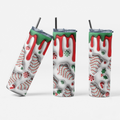 Three views of a stainless steel tumbler with a clear lid and black straw, decorated with a white background, red dripping icing, green icing, and holiday treats like candy canes, snowflakes, and peppermint trees.