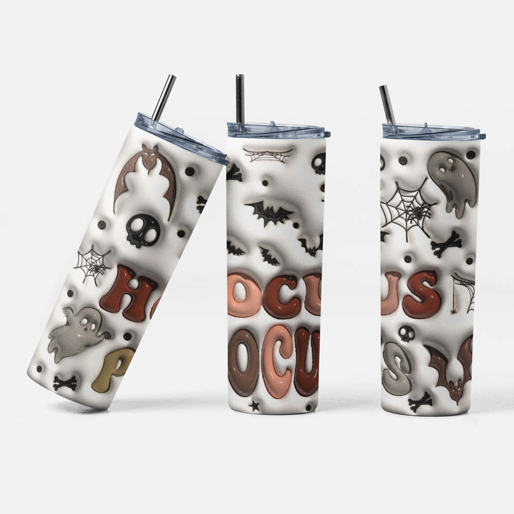 Three views of a white insulated tumbler with a Halloween-themed design featuring 3D-effect text reading 'HOCUS POCA', ghosts, bats, skulls, spiderwebs, and bones on a light gray background.
