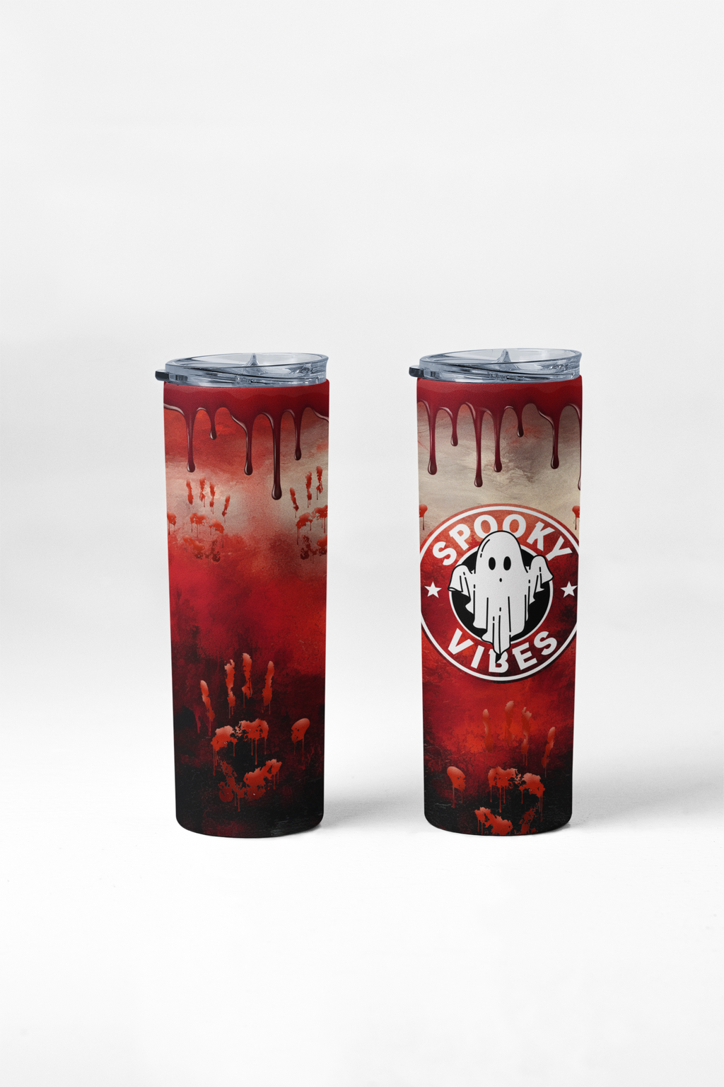 Two slim travel tumblers with clear lids, shown on a light gray studio background. The left tumbler has a red Halloween-themed print with dripping blood, bloody handprints, and a ghostly face near the bottom.