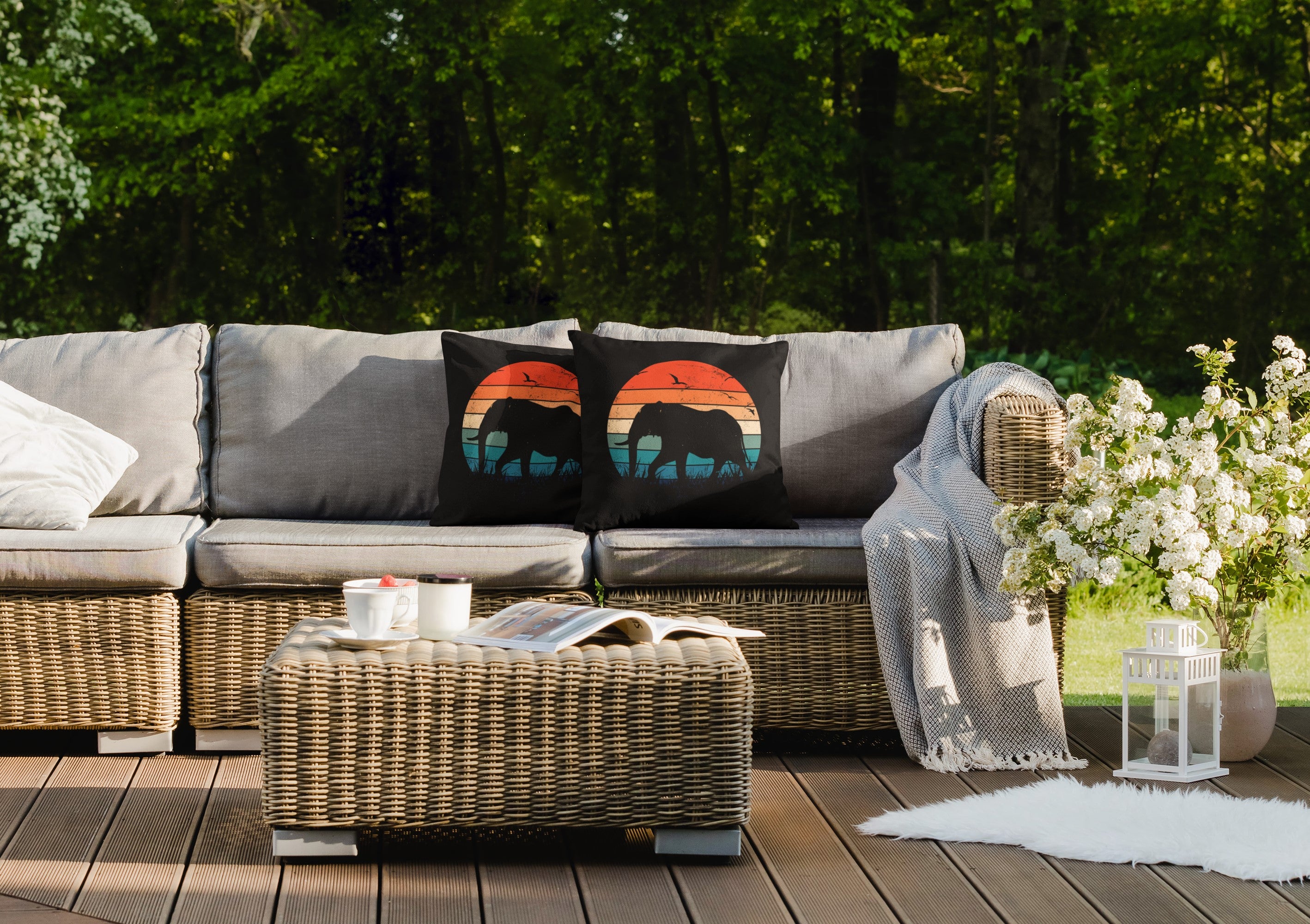 Outdoor patio set with cushions and a blanket on a wooden deck