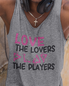 Person wearing a gray tank top with 'Love the Lovers, Hate the Players' text and pink graphics.