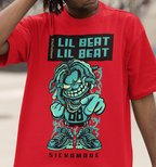 A close-up of a person wearing a bright red graphic t-shirt. The shirt features a black rectangular box with the text 'LIL BEAT LIL BEAT' in teal, above a stylized cartoon character in teal and black with the number '08', and the word 'SICKOMODE' printed below.