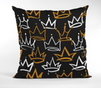 Pillow with crown pattern on a black background