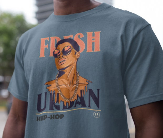 Person wearing a t-shirt with a graphic design and text.
